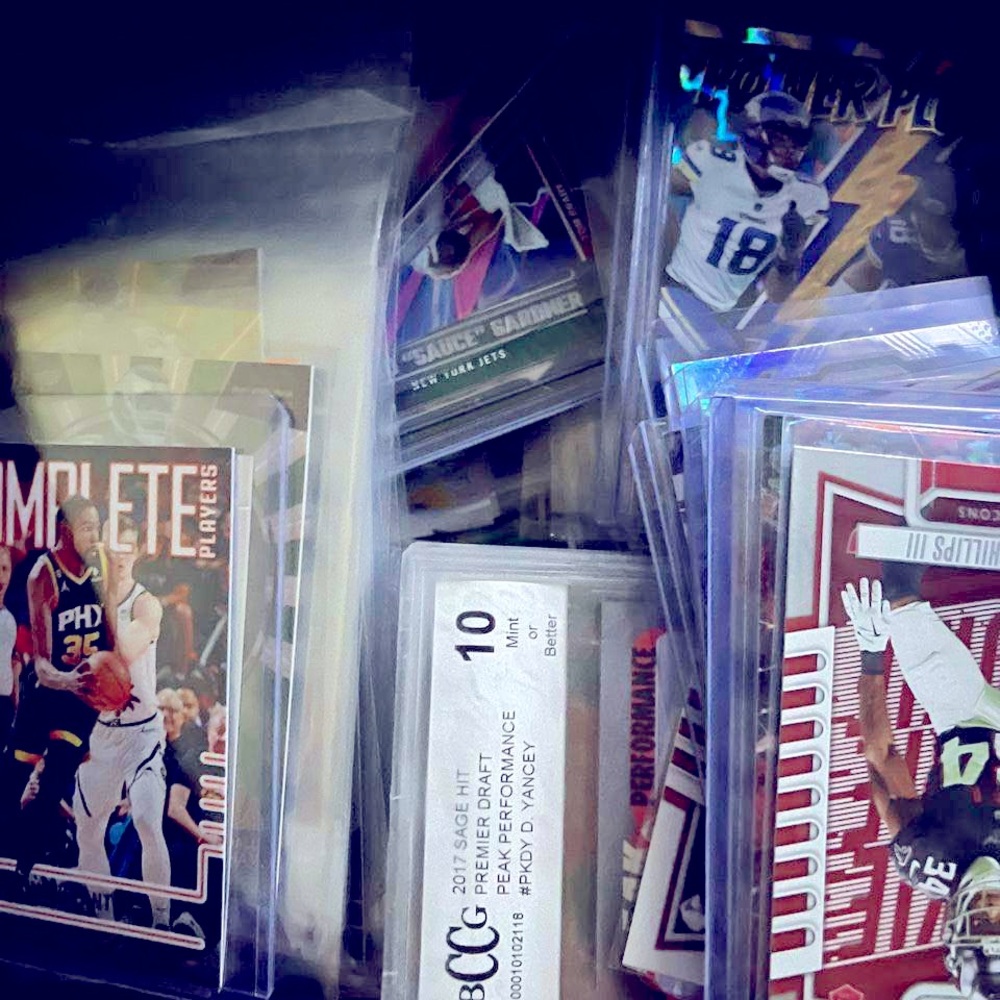 NFL/NBA sports cards rookies slabs numbers autos patches.
We can negotiate